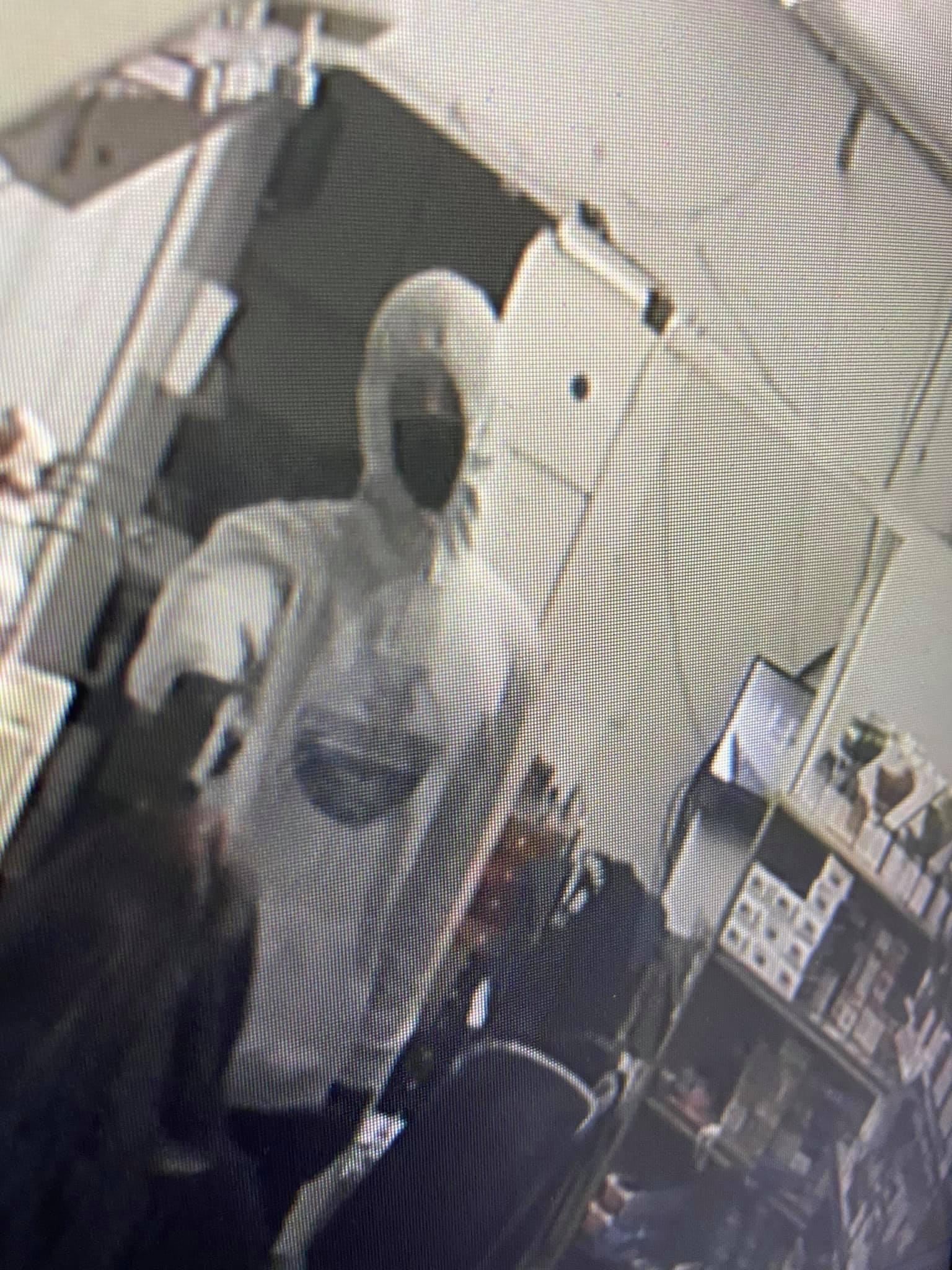 Lang pointing gun at victim